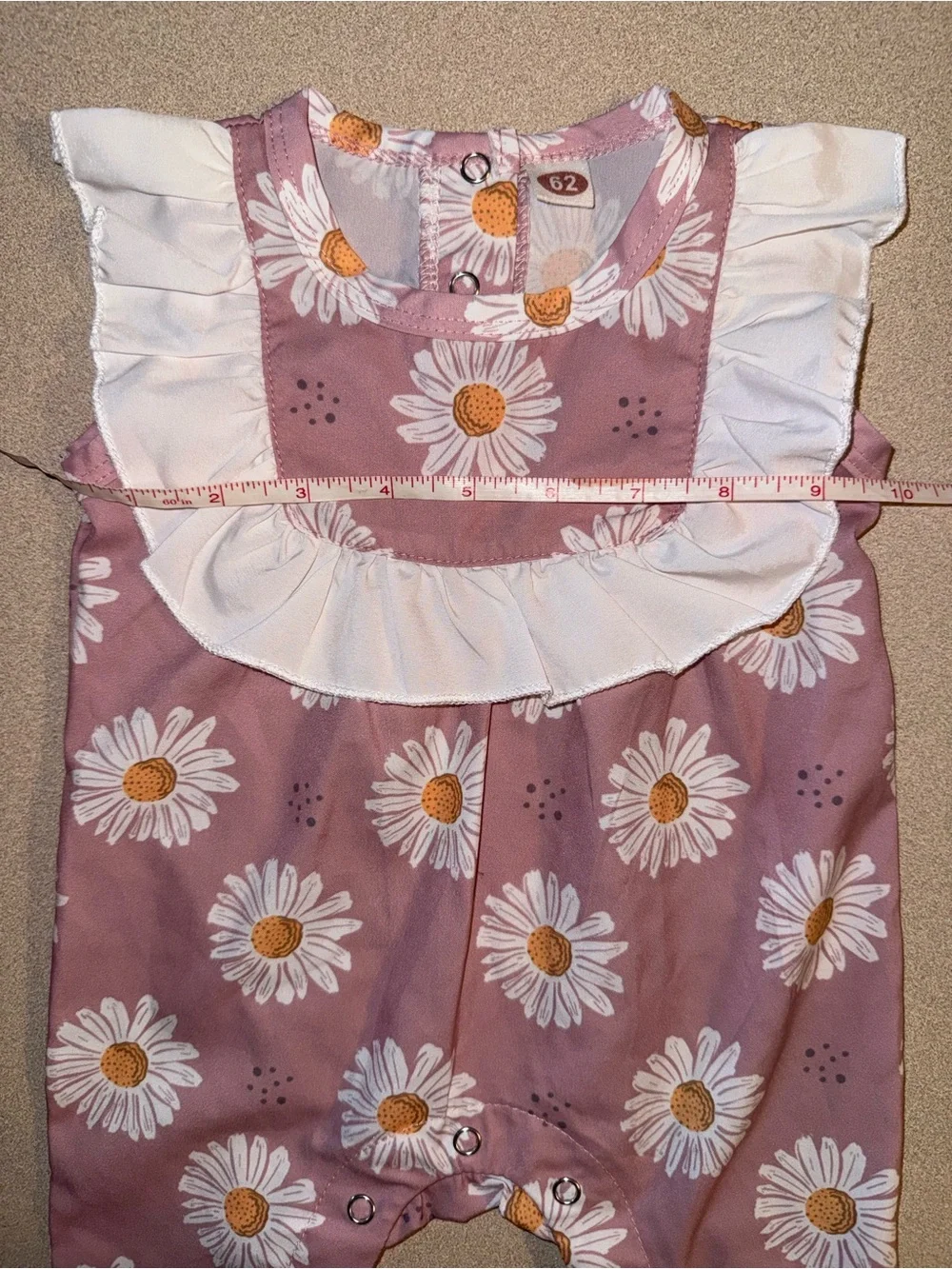 Floral jumpsuit size 62 (I think around 3 months)